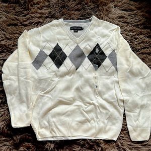 A sweater that I bought a year ago but not interested in the color anymore.